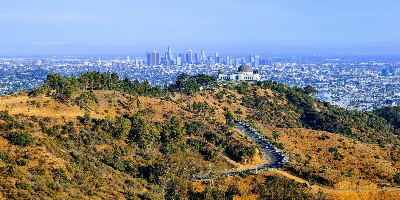 Griffith Observatory with the Downton Los Angeles Skyline in the background. Photo by Dhoomil Sheta (https://unsplash.com/photos/dpNyp0OBuiQ)
